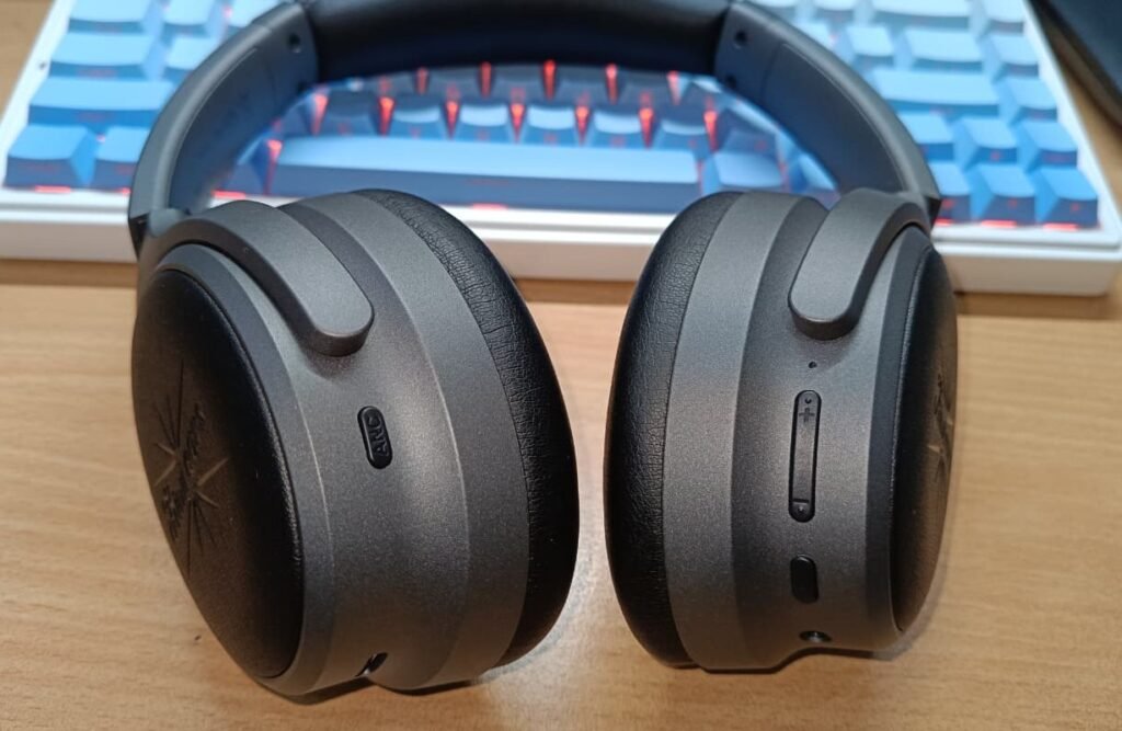 Kiwi Ears ARDOR Placed on desk showing the Control buttons